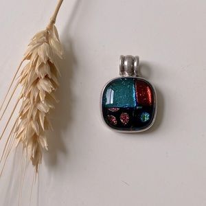 Designer pendant in silver setting